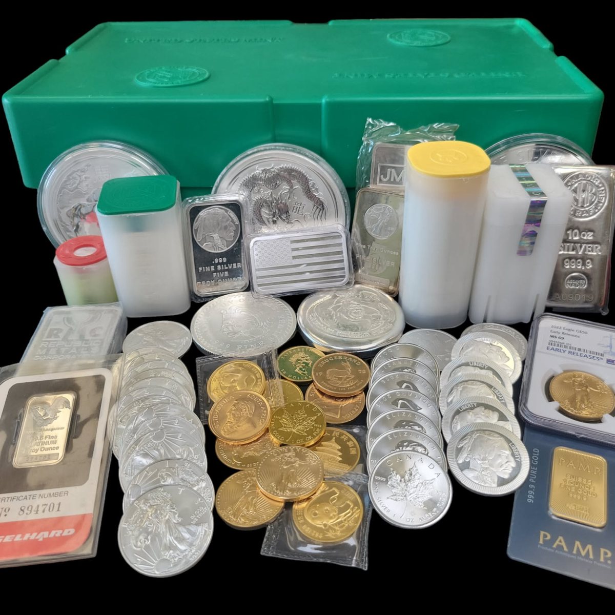 Assorted gold and silver coins and bars